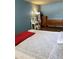 Bedroom featuring a queen bed, vanity, and multiple dressers at 6011 N 33Rd Ave, Phoenix, AZ 85017