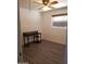 Clean bedroom space featuring a desk, window with blinds, and modern flooring at 6011 N 33Rd Ave, Phoenix, AZ 85017