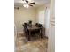 Cozy dining space with marble-topped table, seating for six, adjacent to the kitchen at 6011 N 33Rd Ave, Phoenix, AZ 85017