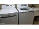 Convenient laundry area with modern LG washer and dryer, plus a utility sink at 6011 N 33Rd Ave, Phoenix, AZ 85017