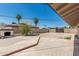 Spacious backyard with a brick fireplace and various plants at 6334 N 37Th Ave, Phoenix, AZ 85019