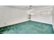 Well-lit bedroom with green carpet, white walls and plantation shutters at 7037 N 11Th Dr, Phoenix, AZ 85021