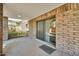 Patio area featuring a brick wall and covered patio at 7037 N 11Th Dr, Phoenix, AZ 85021