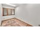 Small room with neutral walls, multiple windows, and neutral carpet at 7037 N 11Th Dr, Phoenix, AZ 85021