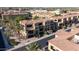 Aerial view of stunning homes featuring multi-level balconies and private entrances in a well-maintained community at 7122 W Ivanhoe St, Chandler, AZ 85226