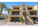 Elegant three-story home featuring a private balcony, garage, and meticulously maintained landscaping at 7122 W Ivanhoe St, Chandler, AZ 85226