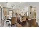 Bright kitchen with stainless steel appliances, spacious island, and a dining area nearby at 7122 W Ivanhoe St, Chandler, AZ 85226