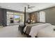 Main bedroom includes balcony access and seating area, offering relaxation and community views at 7122 W Ivanhoe St, Chandler, AZ 85226