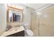 Bathroom features a single sink, frosted glass shower, medicine cabinet with vanity lighting at 730 W Curry St, Chandler, AZ 85225