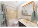 Bathroom features a single sink, marble shower, medicine cabinet with vanity lighting at 730 W Curry St, Chandler, AZ 85225