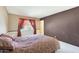 Bedroom features carpet and red curtains that frame a window for natural light at 730 W Curry St, Chandler, AZ 85225