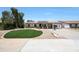 Inviting single-story home with solar panels, well-kept landscaping, and a welcoming front entrance at 730 W Curry St, Chandler, AZ 85225