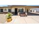 Inviting front porch with a comfortable bench and well-maintained entrance at 730 W Curry St, Chandler, AZ 85225