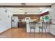 Traditional kitchen with stainless steel appliances and breakfast bar seating at 730 W Curry St, Chandler, AZ 85225