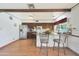 Kitchen featuring a breakfast bar with barstool seating, stainless steel appliances, and wood cabinets at 730 W Curry St, Chandler, AZ 85225