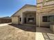 Backyard showcasing a covered patio and ample space for outdoor relaxation and entertaining at 7419 S 45Th Ave, Laveen, AZ 85339