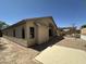 View of the spacious backyard showcasing the patio area and potential for outdoor living at 7419 S 45Th Ave, Laveen, AZ 85339