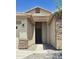 Inviting front entrance featuring desert landscaping and a modern front door at 7419 S 45Th Ave, Laveen, AZ 85339