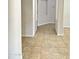 Tile flooring is showcased in this home interior with detailed archways at 7419 S 45Th Ave, Laveen, AZ 85339