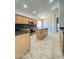 Open kitchen with granite countertops, stainless steel appliances, and a center island at 7419 S 45Th Ave, Laveen, AZ 85339