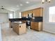 Well-equipped kitchen featuring granite countertops, stainless steel appliances, and a center island at 7419 S 45Th Ave, Laveen, AZ 85339