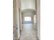 Inviting entryway showcasing the open floor plan with tile flooring and archway details at 7419 S 45Th Ave, Laveen, AZ 85339