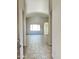 Spacious living room with tile flooring, large windows for natural light, and high ceilings at 7419 S 45Th Ave, Laveen, AZ 85339
