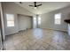 Spacious living room with vaulted ceiling, large windows and neutral color palette at 7419 S 45Th Ave, Laveen, AZ 85339