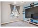Bedroom with soft carpet, a black board, and a bright window for pleasant sunlight at 758 S Lagoon Dr, Gilbert, AZ 85233
