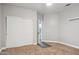 Neutral bedroom with carpet floors, closet, and doorway to the bathroom at 758 S Lagoon Dr, Gilbert, AZ 85233