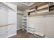 Spacious walk-in closet with built-in shelving and ample storage space at 758 S Lagoon Dr, Gilbert, AZ 85233