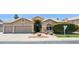 Charming single-story home with a well-maintained front yard and desert landscaping at 758 S Lagoon Dr, Gilbert, AZ 85233
