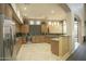 Spacious kitchen with stainless steel appliances, granite countertops, and ample cabinet space at 7601 E Indian Bend Rd # 1040, Scottsdale, AZ 85250
