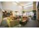 Open-concept living room flowing into a modern kitchen, ideal for entertaining and relaxation at 7601 E Indian Bend Rd # 1040, Scottsdale, AZ 85250