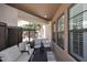 Relaxing outdoor patio with neutral-toned furniture and privacy screening at 7601 E Indian Bend Rd # 1040, Scottsdale, AZ 85250