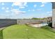 Spacious backyard with a putting green, sparkling pool, and hot tub perfect for outdoor enjoyment and entertaining at 8396 E Granite Pass Rd, Scottsdale, AZ 85266
