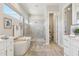 Bright bathroom with soaking tub, glass shower, and stylish vanity at 8396 E Granite Pass Rd, Scottsdale, AZ 85266