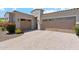 Stunning home featuring a spacious three-car garage and elegant architectural details at 8396 E Granite Pass Rd, Scottsdale, AZ 85266