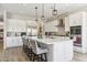 Bright and airy kitchen with a large island, stainless steel appliances, and contemporary design at 8396 E Granite Pass Rd, Scottsdale, AZ 85266