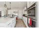 Gourmet kitchen with a large island, stainless steel appliances, and custom cabinetry at 8396 E Granite Pass Rd, Scottsdale, AZ 85266