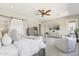 Comfortable main bedroom featuring a barn door leading to the bathroom at 8396 E Granite Pass Rd, Scottsdale, AZ 85266