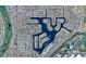 An aerial view showcases waterfront homes nestled along Desert Harbor Lake, offering stunning lakeside living and community parks at 9109 W Watson Ln, Peoria, AZ 85381