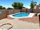 Enjoy the desert lifestyle with this private pool, fire pit, and tastefully decorated block fence at 9109 W Watson Ln, Peoria, AZ 85381