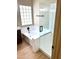 A luxurious bathroom features a separate tub and shower with granite countertops at 9109 W Watson Ln, Peoria, AZ 85381