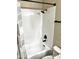 Bright bathroom features a shower-tub combination with black fixtures at 9109 W Watson Ln, Peoria, AZ 85381
