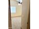 View of a bedroom with neutral walls, carpet flooring, and a window with blinds at 9109 W Watson Ln, Peoria, AZ 85381