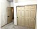 Bedroom showcasing closet with sliding doors, carpet flooring, and neutral walls at 9109 W Watson Ln, Peoria, AZ 85381