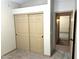 Bedroom showcasing closet with sliding doors, carpet flooring, and neutral walls at 9109 W Watson Ln, Peoria, AZ 85381