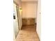 Hallway nook with three cabinets, granite countertops, and modern lighting at 9109 W Watson Ln, Peoria, AZ 85381