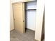 Spacious closet with sliding doors and ample shelving space for optimal organization at 9109 W Watson Ln, Peoria, AZ 85381